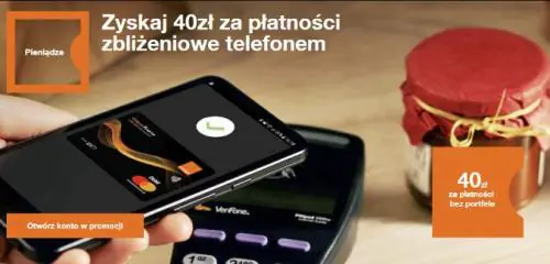 dłoń przykładające smartfon do terminala płatniczego