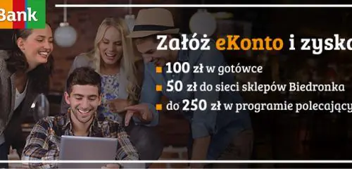 mężczyzna z tabletem i osoby stojące za nim